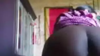 Village chick hikes up dress to reveal her XXX ass and pussy online